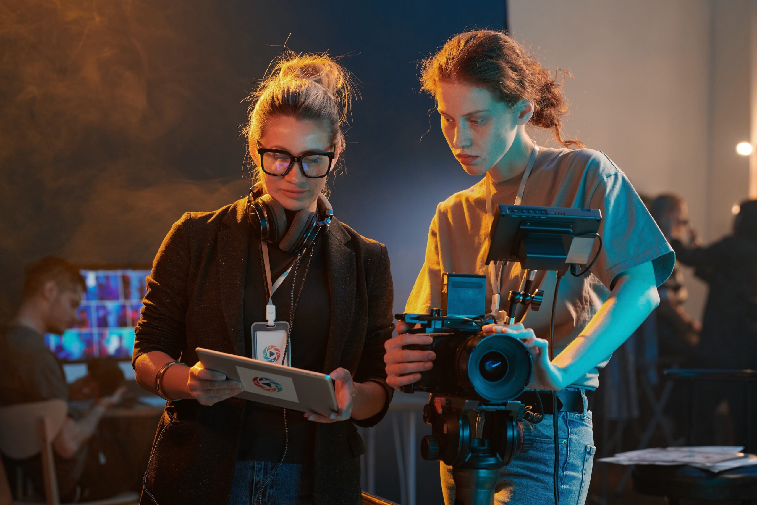 crew members and director coordinating on-set commercial production