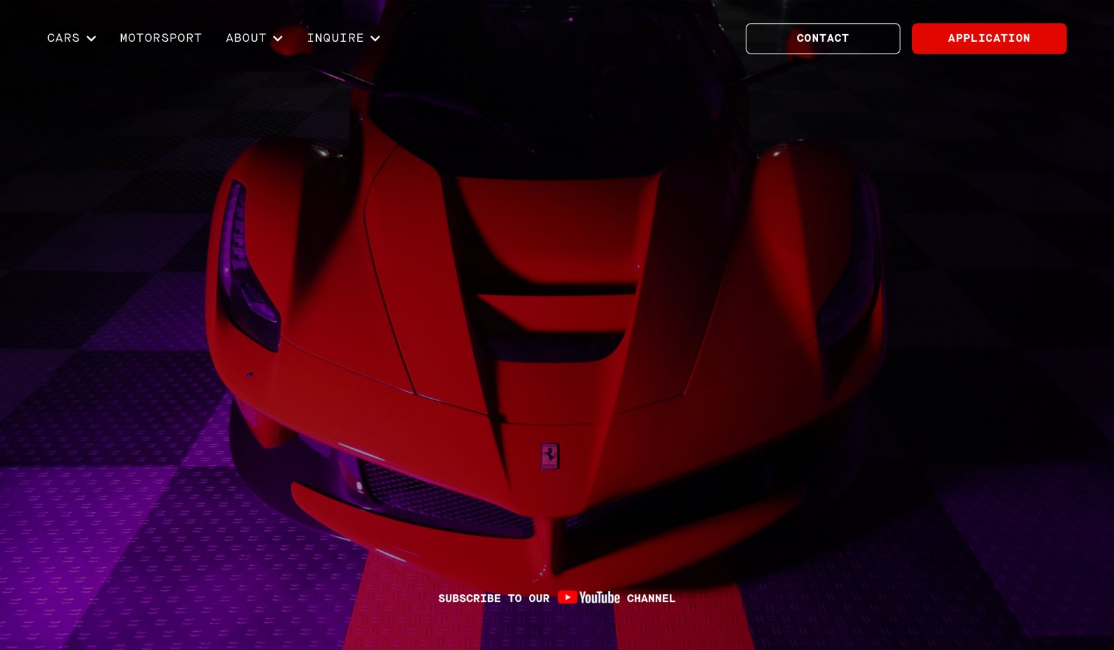 The studiomotors.com homepage: a red Ferrari on the lit showroom floor